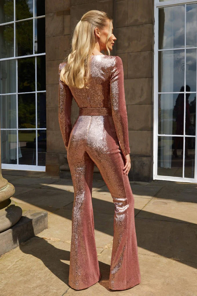 Men's Belro sequin long-sleeved jumpsuit with shiny, eye-catching sequins and a fitted design, perfect for stylish evening wear.