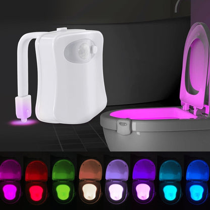 Belro LED toilet night light illuminating a bathroom with soft, colorful lighting for nighttime visibility and convenience.