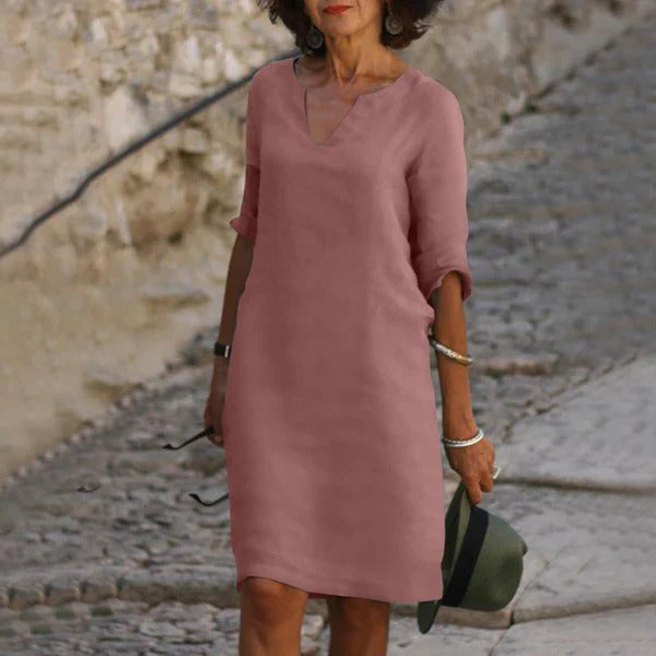 Belro V-neck three-quarter sleeve dress with a fitted silhouette, soft fabric, and stylish design suitable for casual or semi-formal wear.