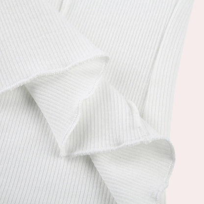 Belro simple long sleeve women's top in soft fabric, shown in a neutral color with a classic round neckline and relaxed fit.