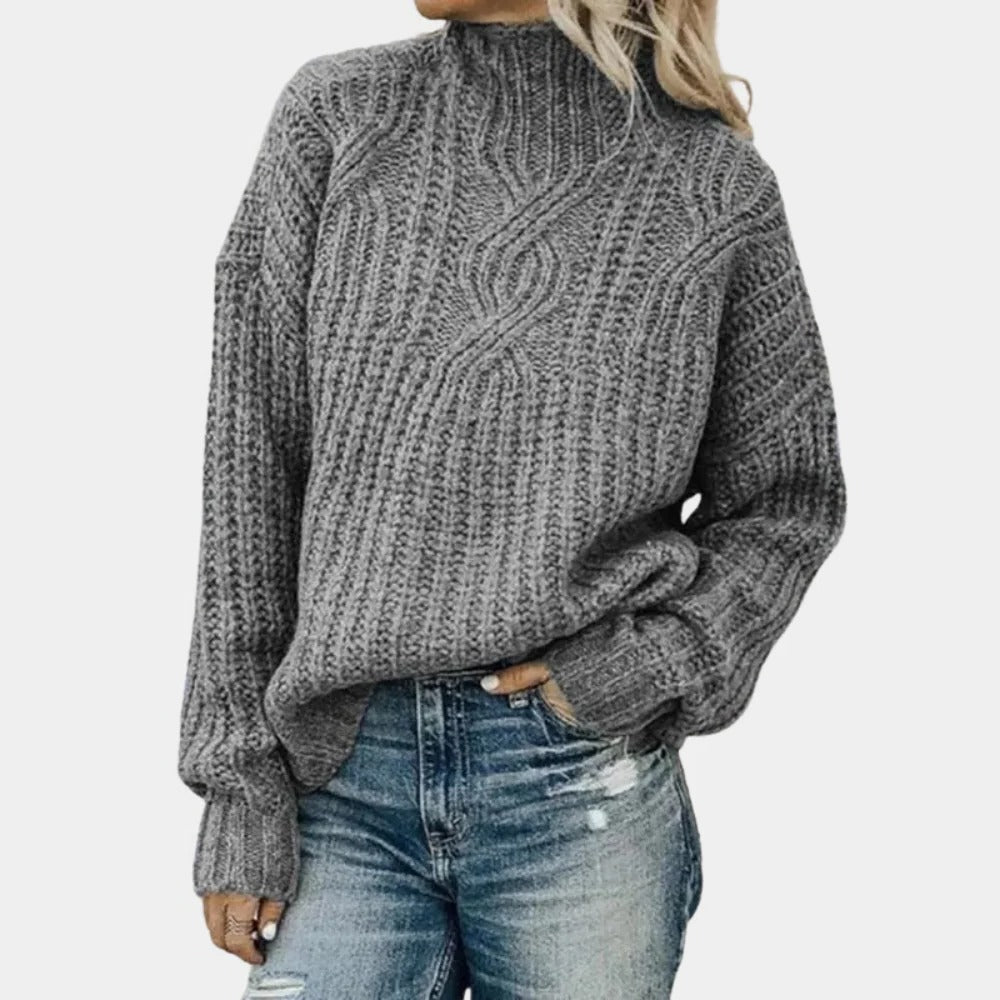 Soft knitted women's sweater from Belro, featuring a cozy design with long sleeves and a round neckline, perfect for casual wear.