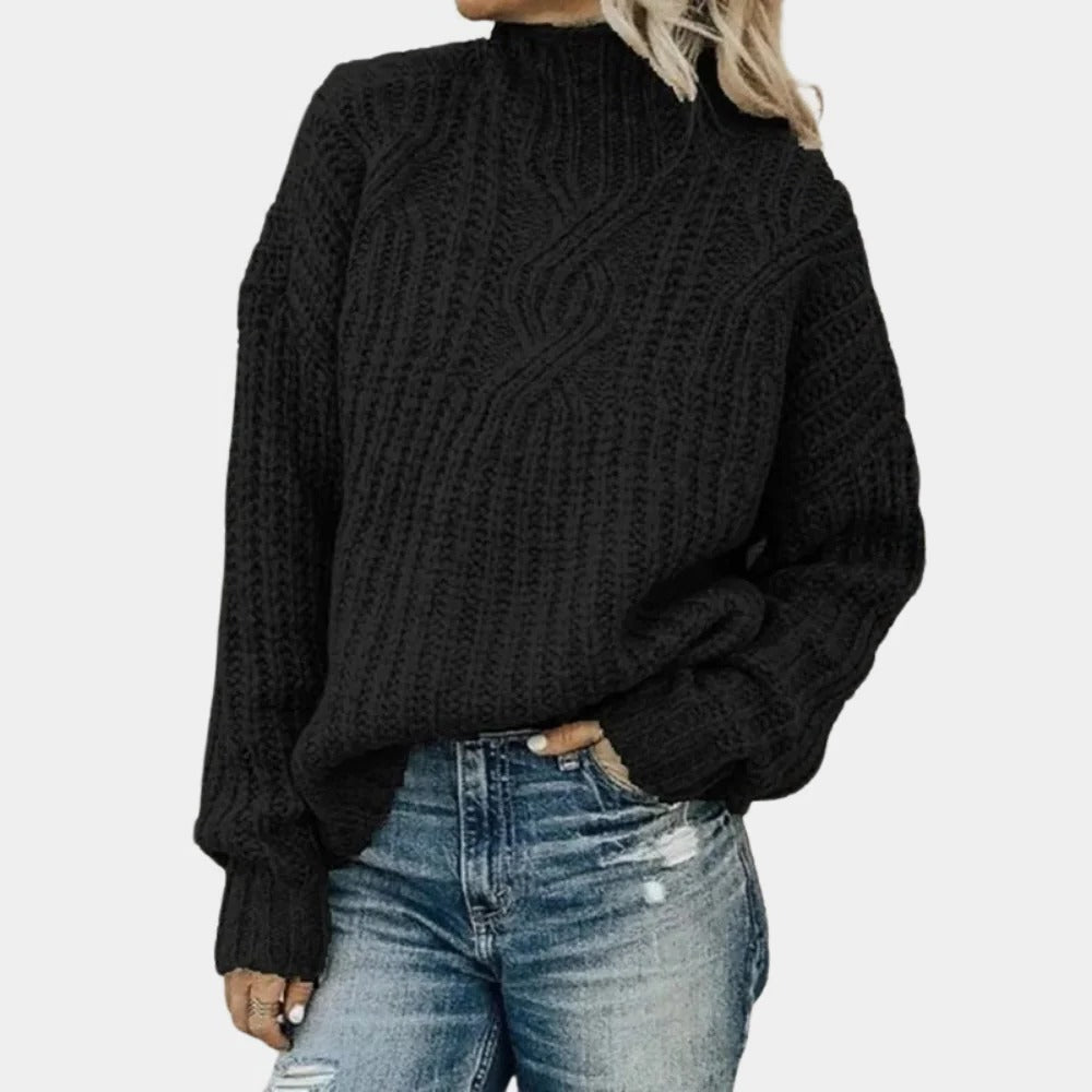 Soft knitted women's sweater by Belro with a cozy fit, featuring a classic crewneck design and warm, textured fabric.