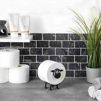 Belro outdoor toilet paper holder mounted on a garden wall, made of durable metal with a sleek finish for outdoor use.