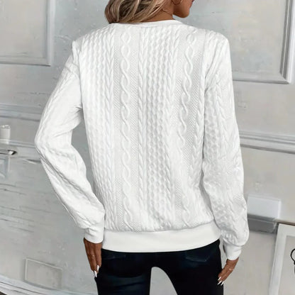 Soft and casual textured Belro women's sweater with a cozy knit design, featuring a relaxed fit and neutral color.