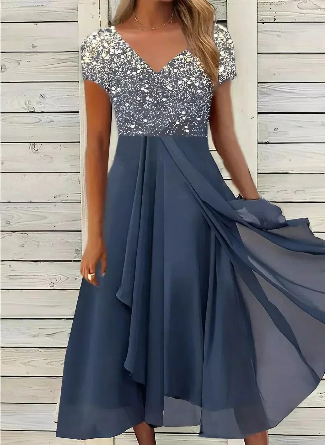Women’s chiffon party dress by Belro featuring a flowing, elegant design perfect for special occasions.