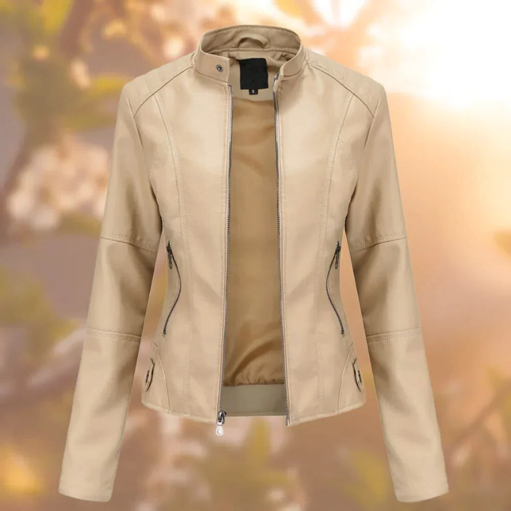 Women's black leather jacket by Belro, stylish and fitted with zipper details, displayed on a hanger.