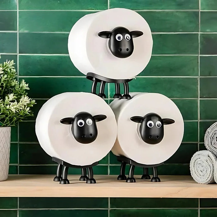 Belro outdoor toilet paper holder mounted on a garden wall, made of durable metal for outdoor bathroom convenience.