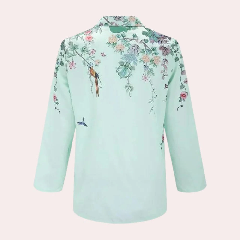 Belro floral ladies blouse featuring a colorful, flowy fabric with long sleeves and a relaxed fit, perfect for casual wear.