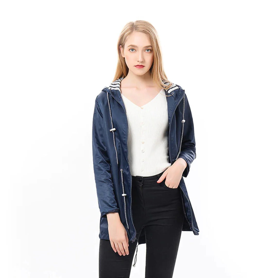 Long elegant Mackintosh rain jacket for women by Belro, showcasing a sleek, waterproof outerwear design with a tailored fit.