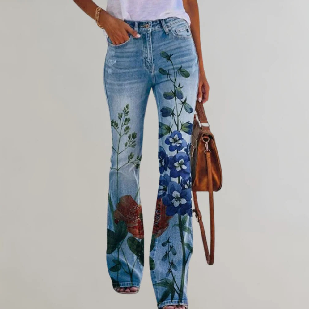 Women's Belro flared trousers featuring a high waist and wide-leg design, shown in a relaxed fit on a model.