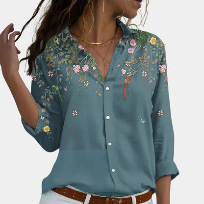 Floral Belro ladies blouse with long sleeves and a vibrant floral pattern, stylish top for women’s casual or office wear.