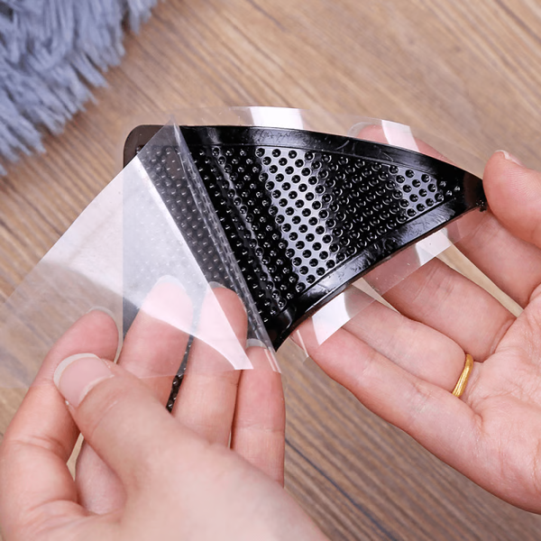 Belro non-slip rug gripper securing a rug on a hardwood floor, preventing slipping and shifting in home decor and rug safety.