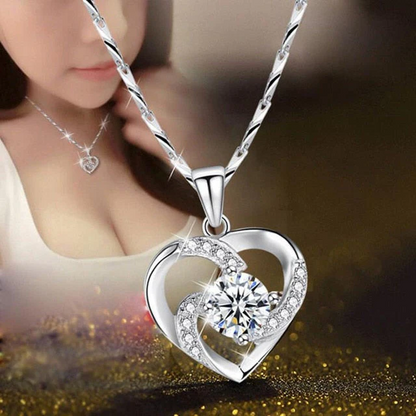 Sterling silver crystal heart necklace with CZ pendant, elegant jewelry accessory featuring Belro branding.