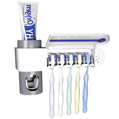 Belro UV light toothbrush sterilizer and toothpaste dispenser showing sleek white design with toothbrush and toothpaste inside