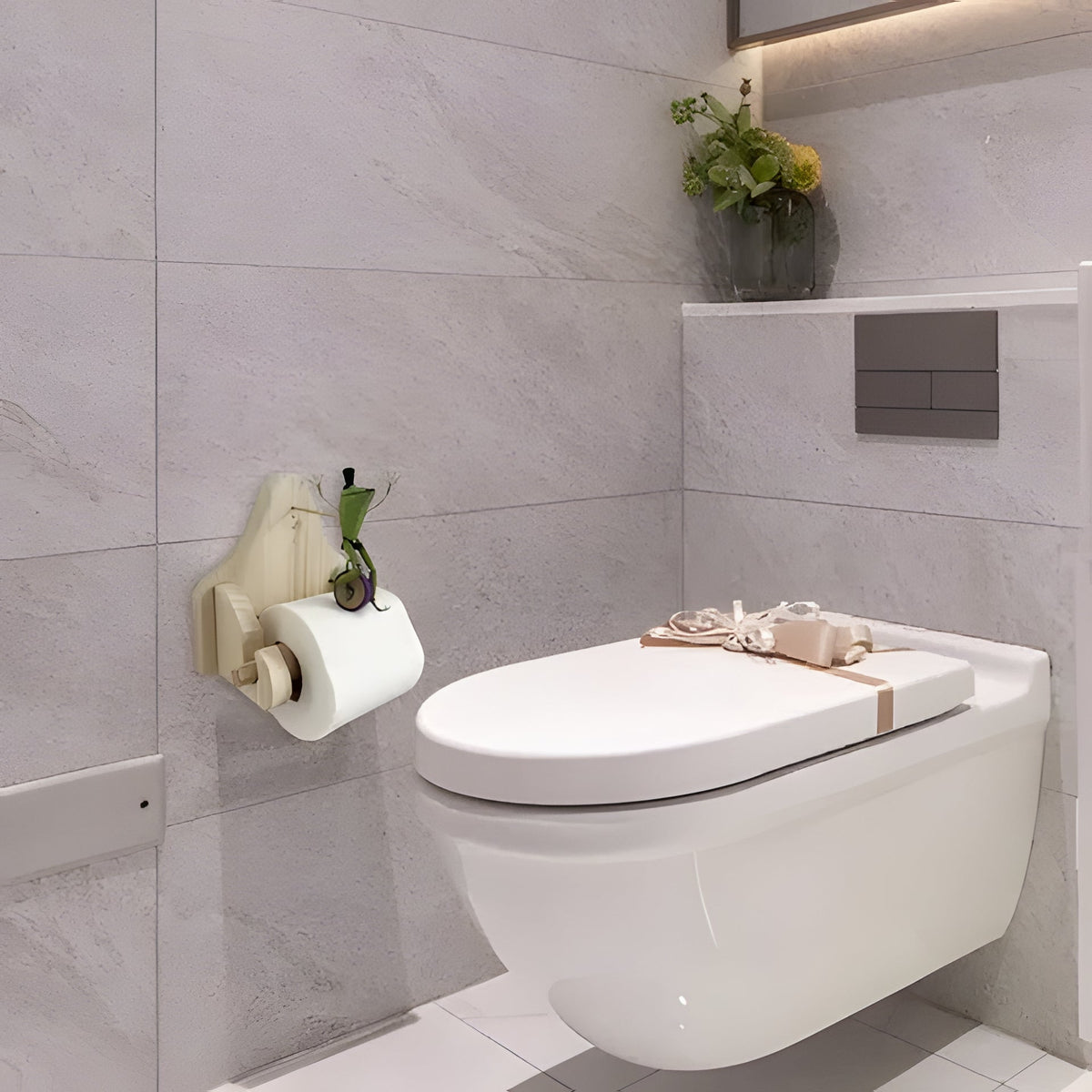 Belro Frog Rider outdoor toilet paper holder mounted on a wall, featuring a playful frog design for garden or outdoor use