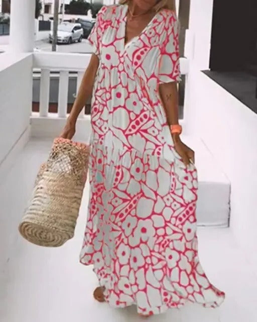 Belro long dress with short sleeves and floral print, lightweight fabric, casual style perfect for summer or warm weather.