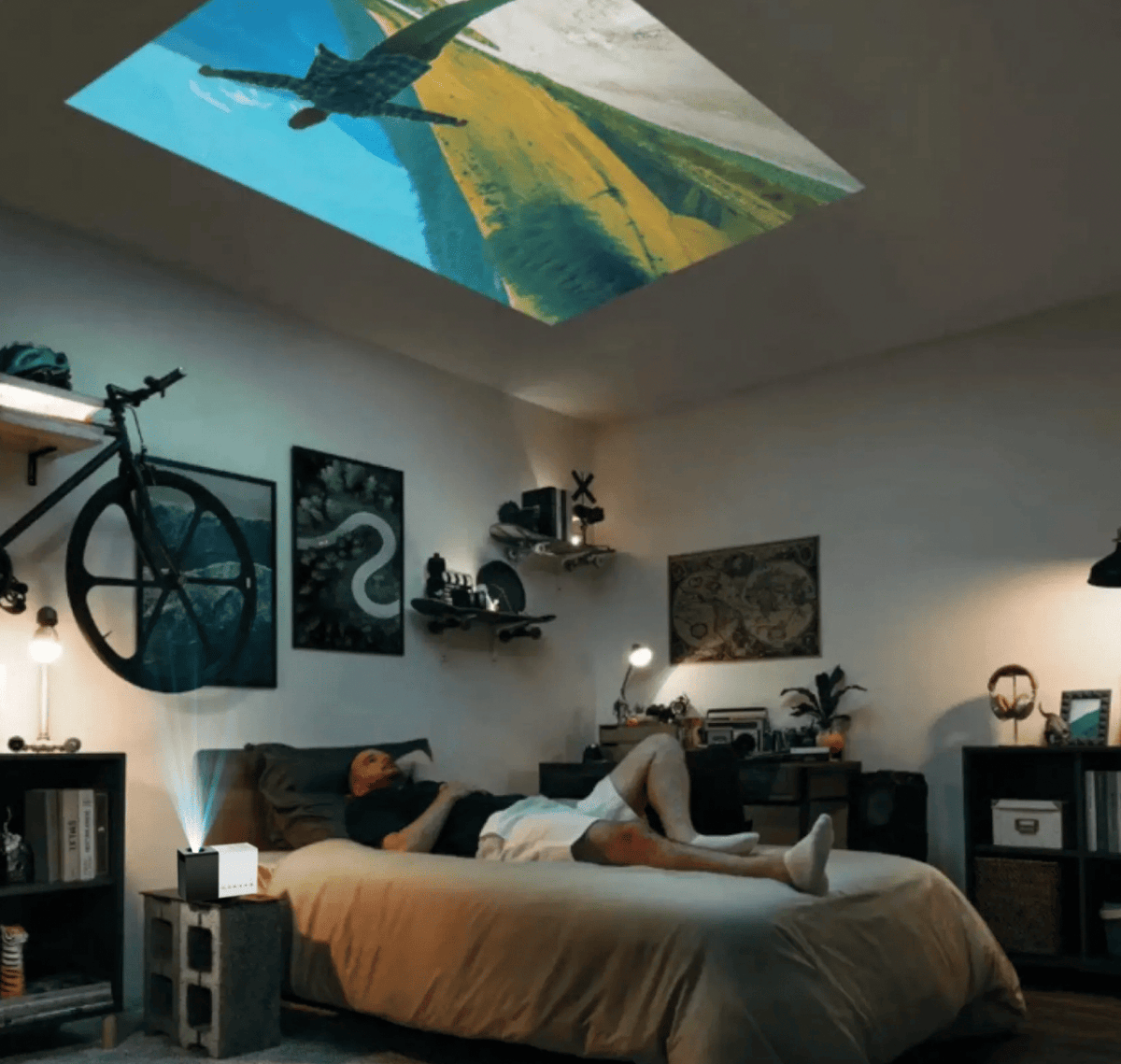 Belro Mini Movie Projector displaying a colorful image on a wall, compact electronic device for home entertainment.