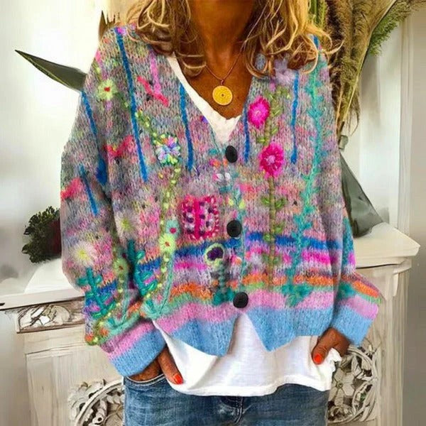 Colorful floral pattern ladies' sweater by Belro, featuring a cozy knit design suitable for casual wear.