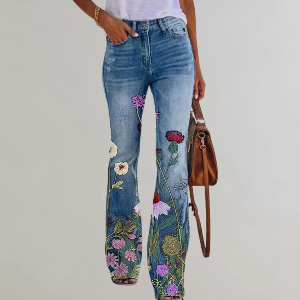 Women’s Belro flared trousers with high waist and wide leg opening, styled with casual top and neutral background.