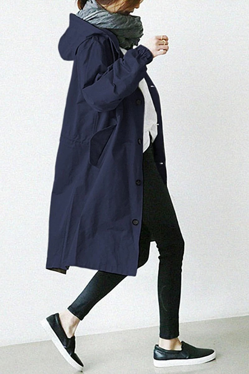 Belro hooded waterproof trench coat showing front view with adjustable waist belt and rain-resistant fabric.