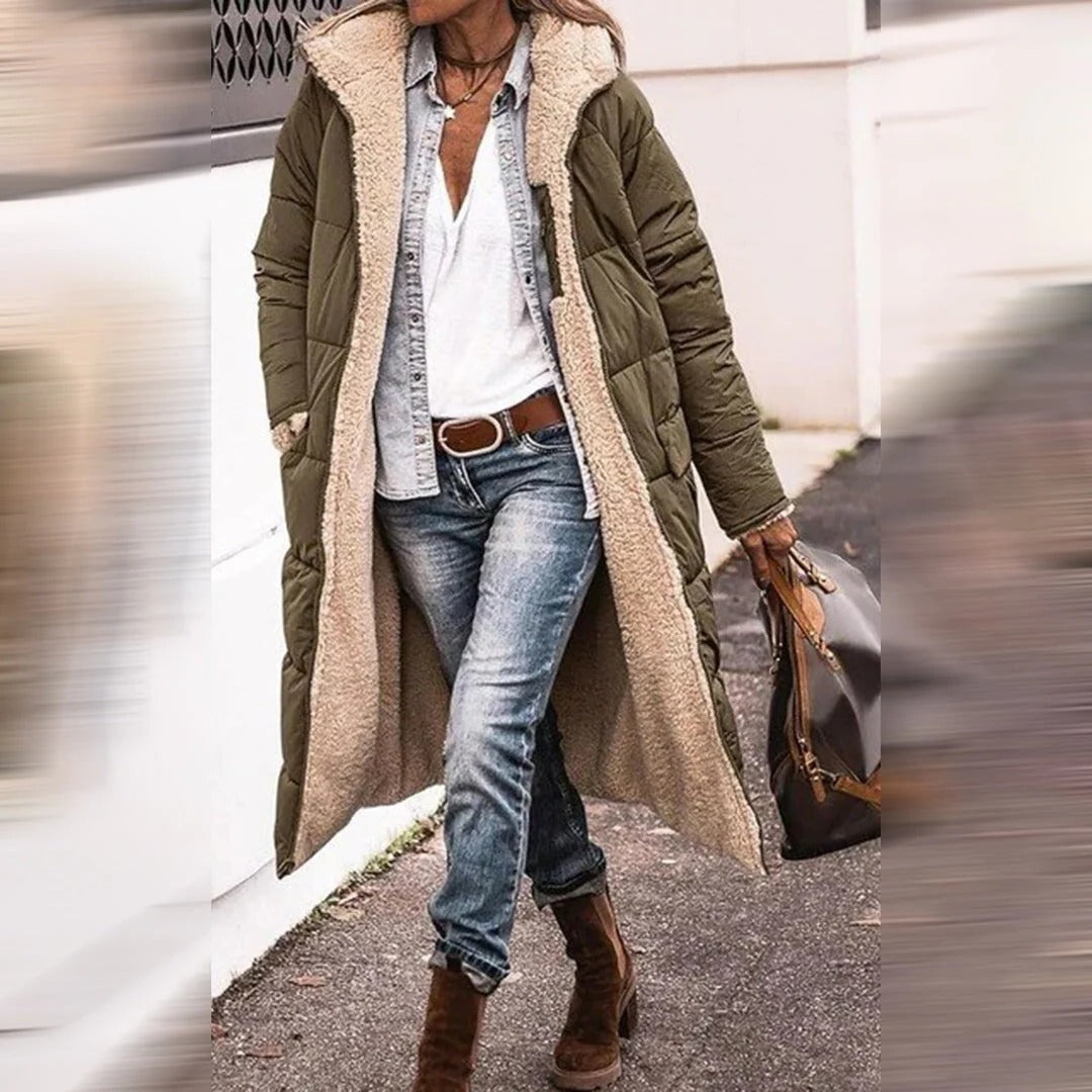 Belro long winter coat for women, stylish and warm, shown on a model with a high collar and knee-length design.