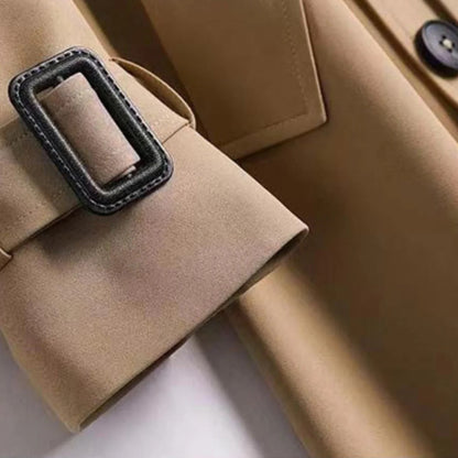 Belro classic trench coat displayed on a hanger, showcasing its timeless style, beige color, and tailored fit.