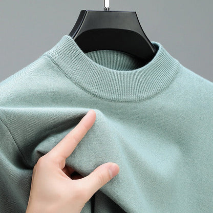 Belro men's cashmere sweater with an elegant hem, soft knit fabric, and classic fit, displayed on a hanger.