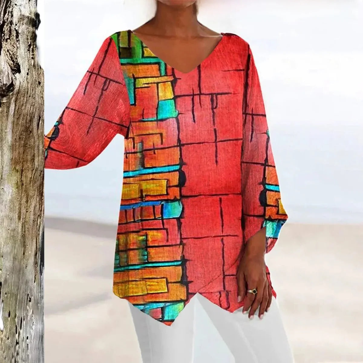 Women's vintage V-neck top by Belro featuring an elegant fit, shown on a model with a stylish, classic design.