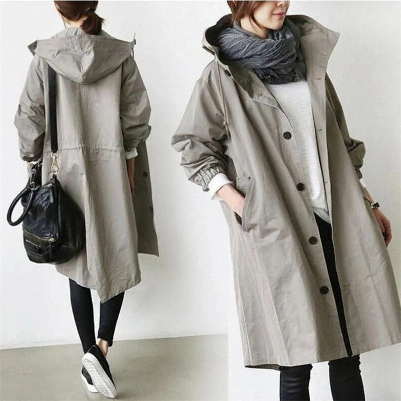 Belro hooded waterproof trench coat with front pockets and adjustable waist, designed for outdoor weather protection.