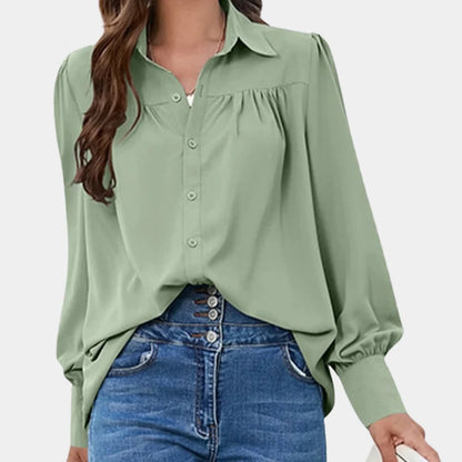 Belro pleated long sleeve women's blouse with elegant design, featuring a flowy fabric and classic collar detail.