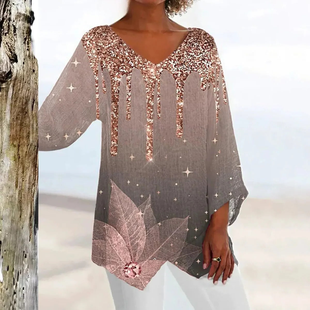 Women's vintage V-neck top by Belro featuring an elegant fit, shown in a stylish image highlighting the neckline and fabric details.