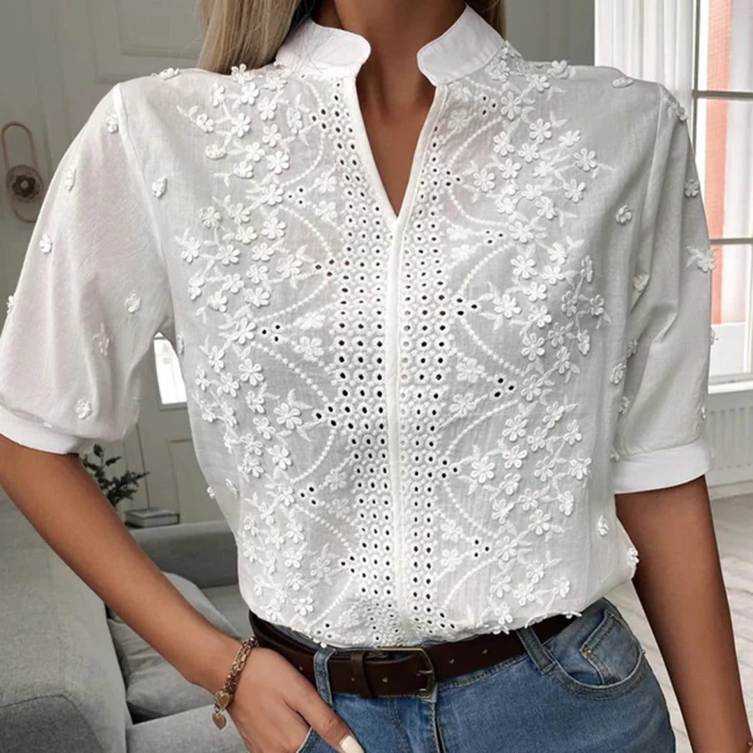 Belro fashionable blouse in soft fabric, featuring a stylish design with a V-neck and long sleeves, perfect for casual or office wear.