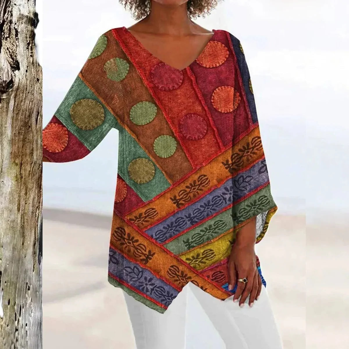 Women’s vintage V-neck top by Belro, fitted and elegant, with soft fabric and classic design, shown on a model.