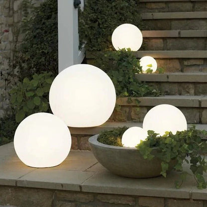 Wireless weatherproof LED globe light in 16 colors, Belro outdoor sphere light for umbrellas and outdoor decor, illuminated in vibrant colors.