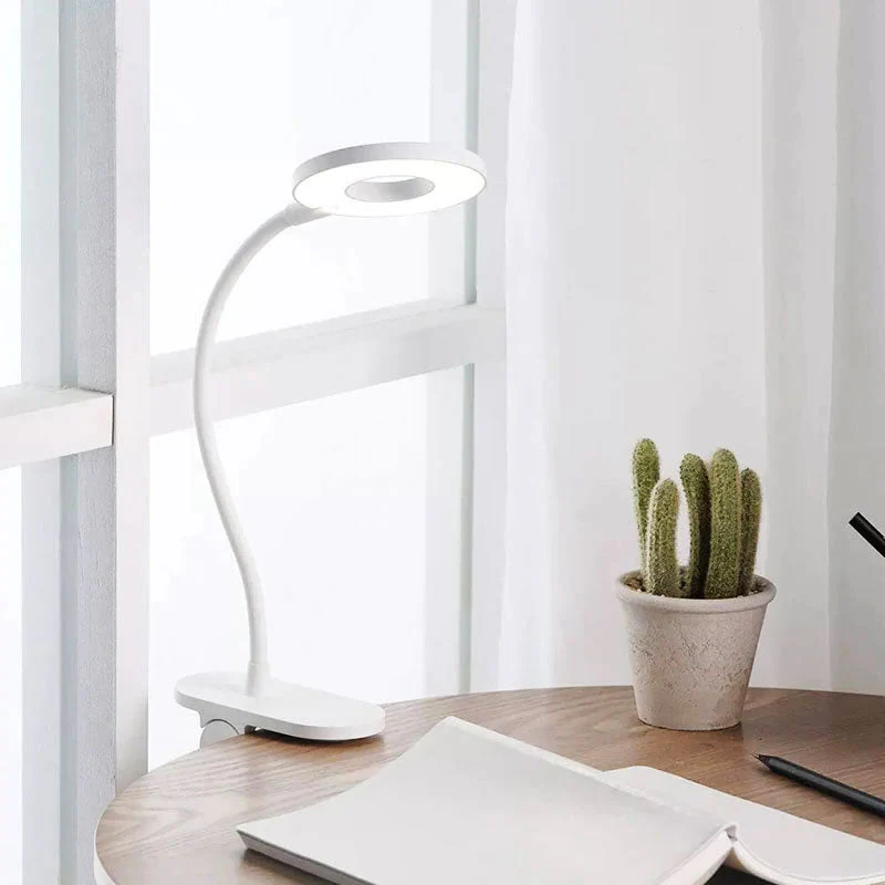 Wireless table clip desk lamp by Belro with adjustable arm and LED light, ideal for home and outdoor use.