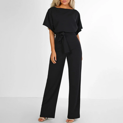 Belro simple and chic jumpsuit, stylish clothing with a fitted waist and wide-leg pants, displayed on a hanger.