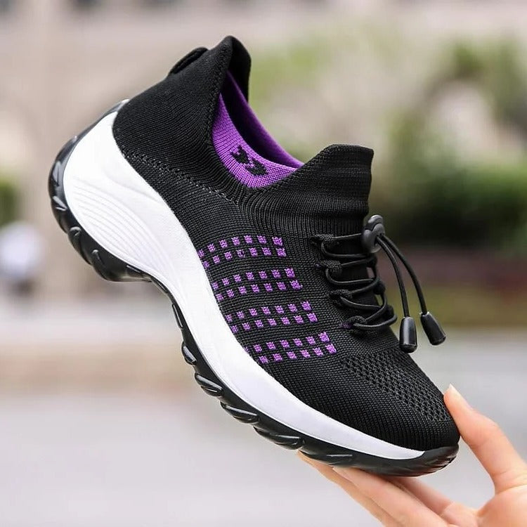Belro orthopaedic sneakers in black with cushioned soles and supportive design, ideal for comfortable, healthy footwear.