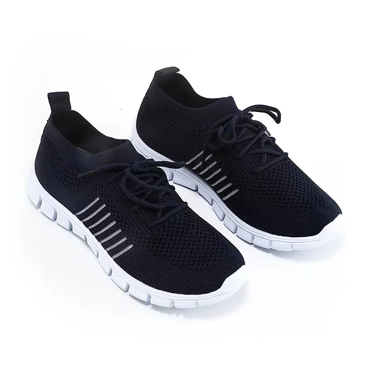 Belro orthopedic sneakers in gray with supportive insoles, designed for comfort and foot health, displayed on a plain background.