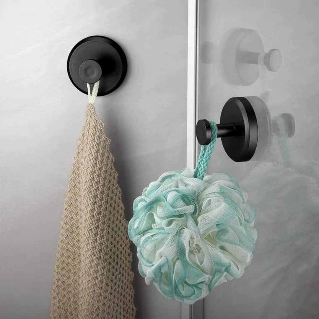 Belro Instant Grip suction hooks attached to a smooth bathroom tile for organizing towels and accessories.