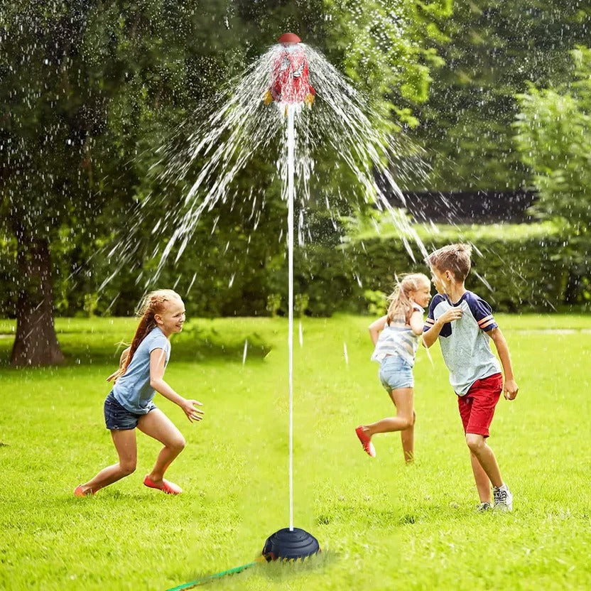 Kids water rocket toy by Belro, showing a colorful rocket ready to launch with kids playing outdoors.