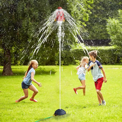 Kids water rocket toy by Belro, showing a colorful rocket ready to launch with kids playing outdoors.