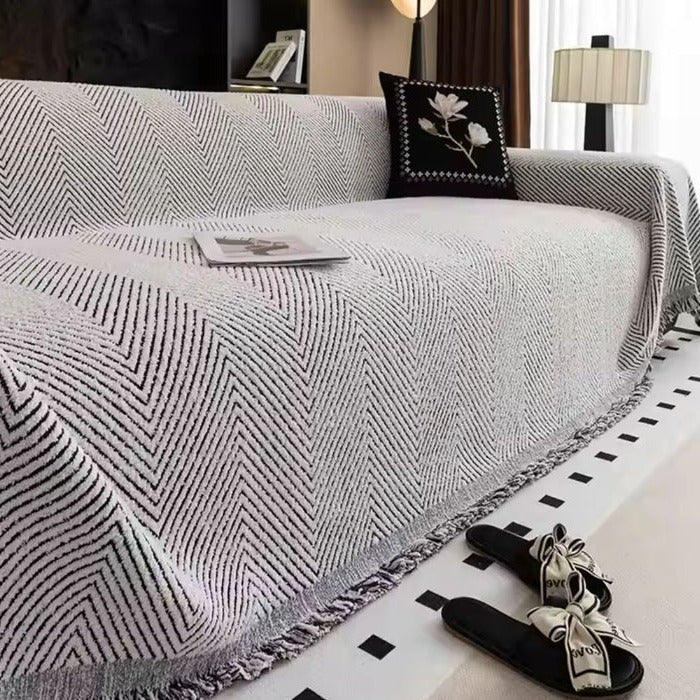 Belro Stripe Herringbone Couch Cover in neutral tones, showcasing its stylish herringbone pattern on a comfortable sofa.