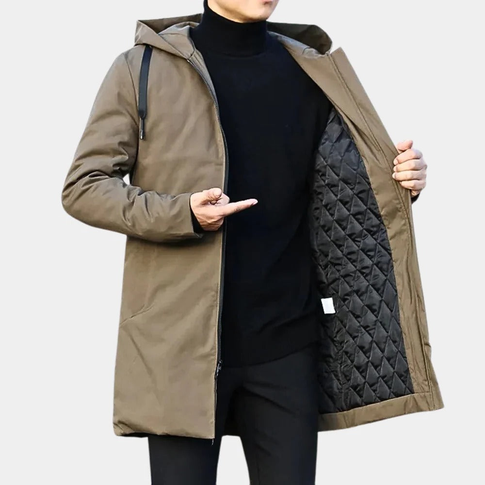 Belro Neat Long Men's Coat hanging on a hanger, showing its tailored design and classic style in a neutral color.