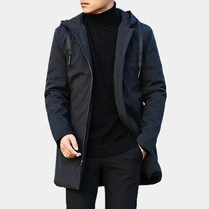 Belro Neat Long Men's Coat displayed on a hanger, showcasing its tailored design and dark color, ideal for formal or casual wear.