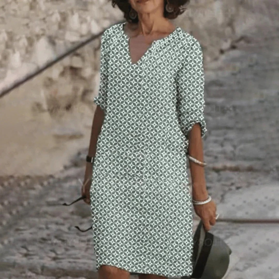 Elegant Belro dress featuring a flowing fabric and stylish design, perfect for formal occasions and comfortable wear.