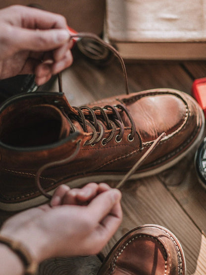 Men's full grain leather moccasin toe work boots by Belro, featuring durable leather construction and sturdy rubber soles.
