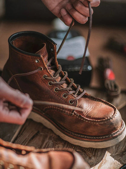 Men's full grain leather moccasin toe work boots by Belro, featuring sturdy construction and rugged footwear design.