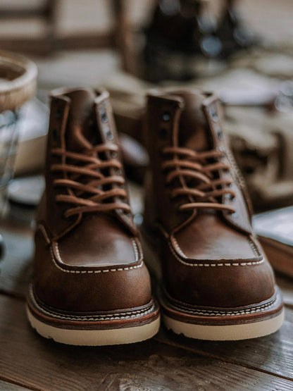 Men's full grain leather moccasin toe work boots by Belro featuring sturdy construction and classic footwear style.