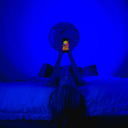 Belro Smart Sunset Lamp Deluxe emitting warm ambient light, designed for relaxing nighttime illumination.