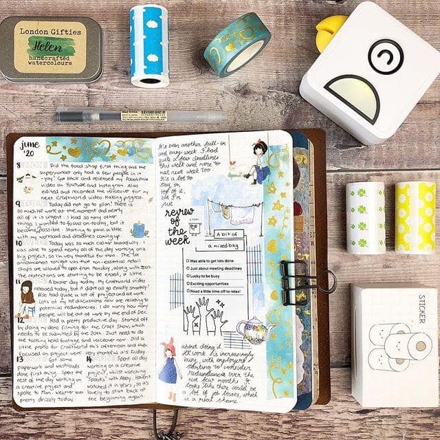 Belro pocket inkless printer, compact electronic device with sleek design, shown with printed photos on its surface.